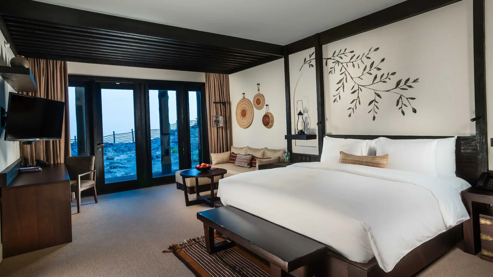 bedroom with horizon view at alila jabal akhdar oman