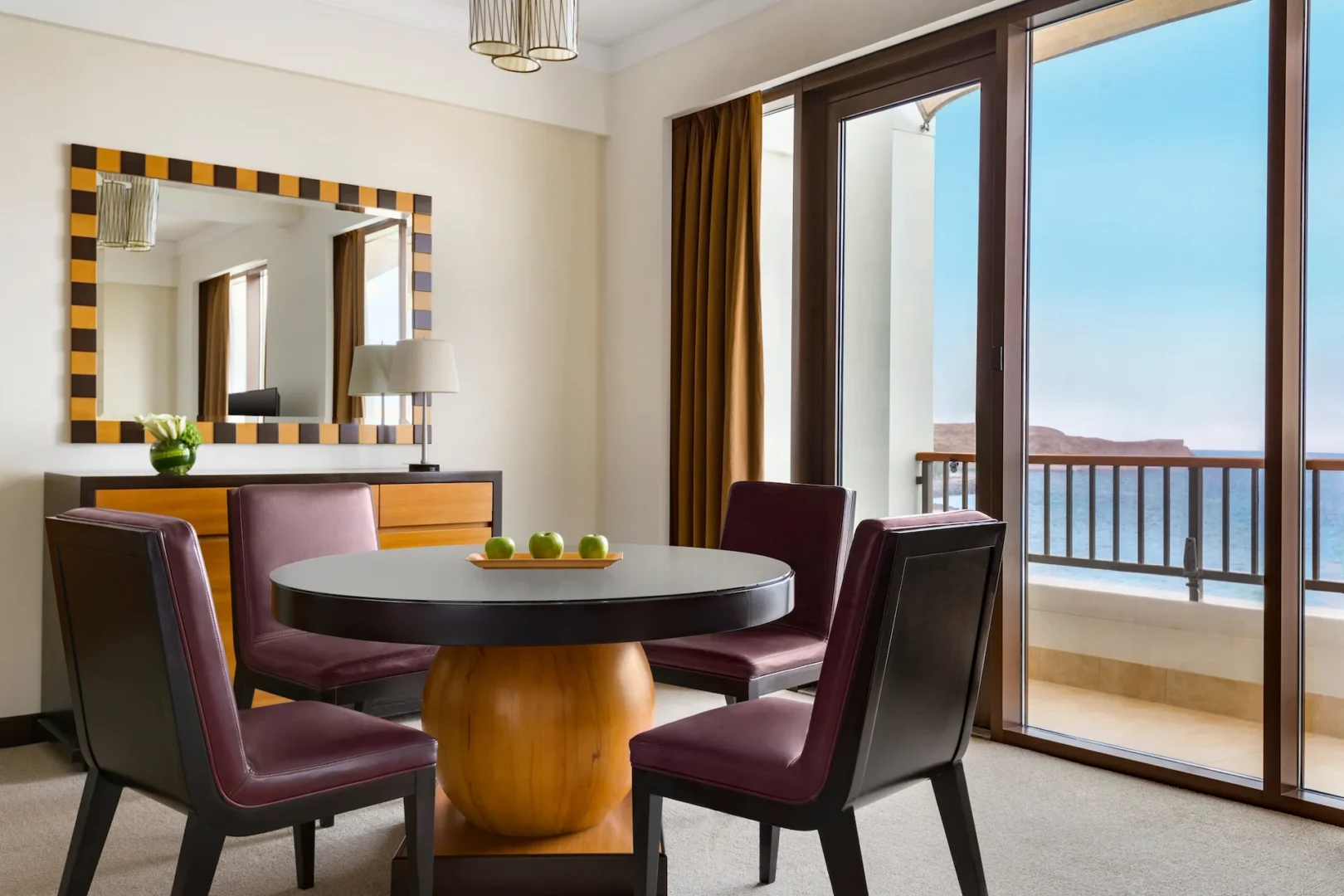 dining table in deluxe suite sea view hilton muscat al waha oman