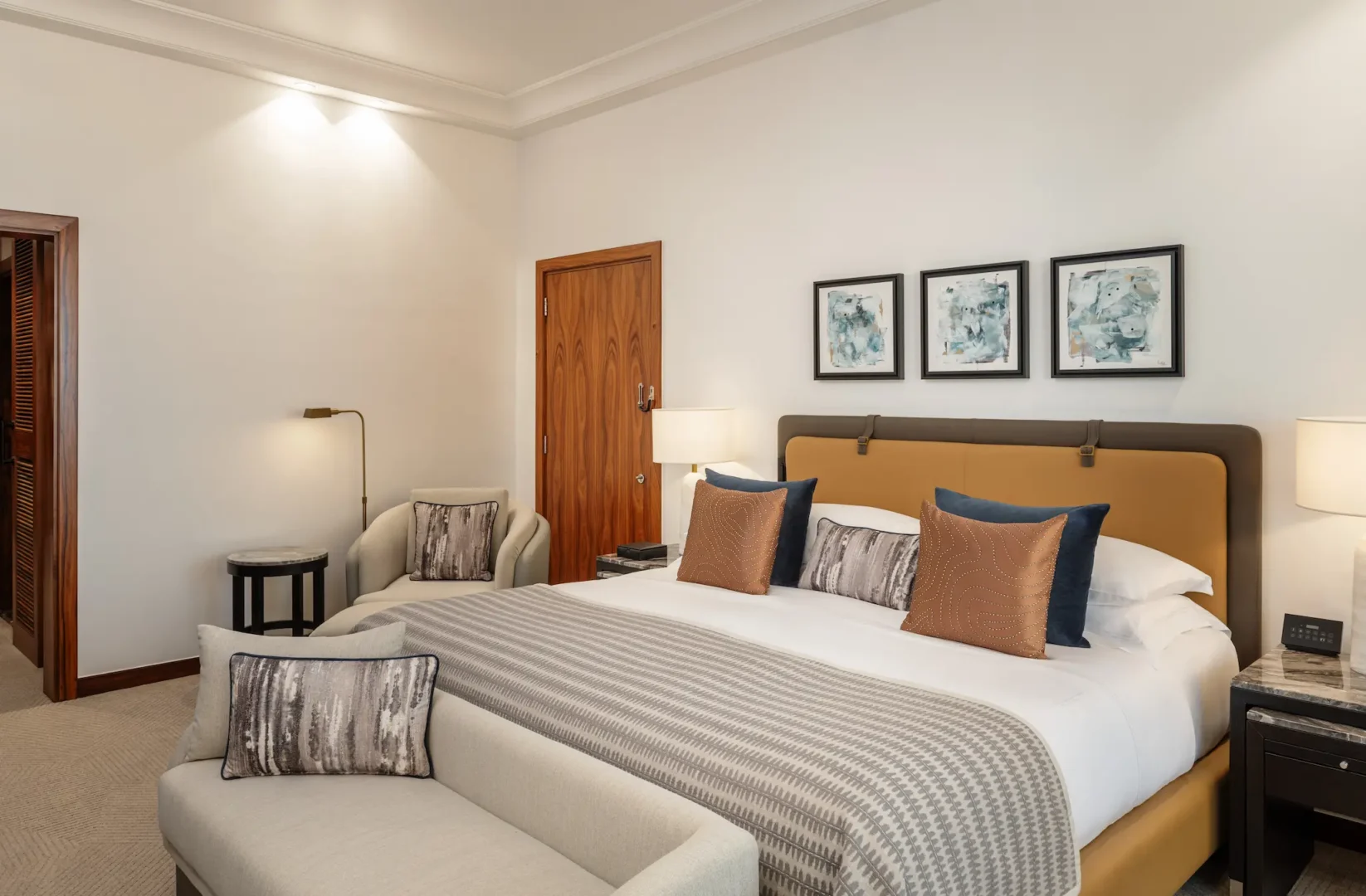grosvenor house dubai deluxe room king bed view with panoramic outlook and refined luxury styling