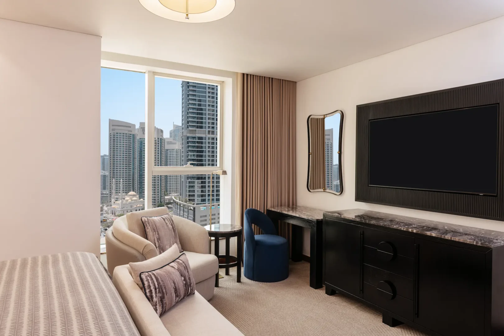 grosvenor house dubai deluxe suite bedroom view showcasing refined luxury styling and an elegant spacious layout