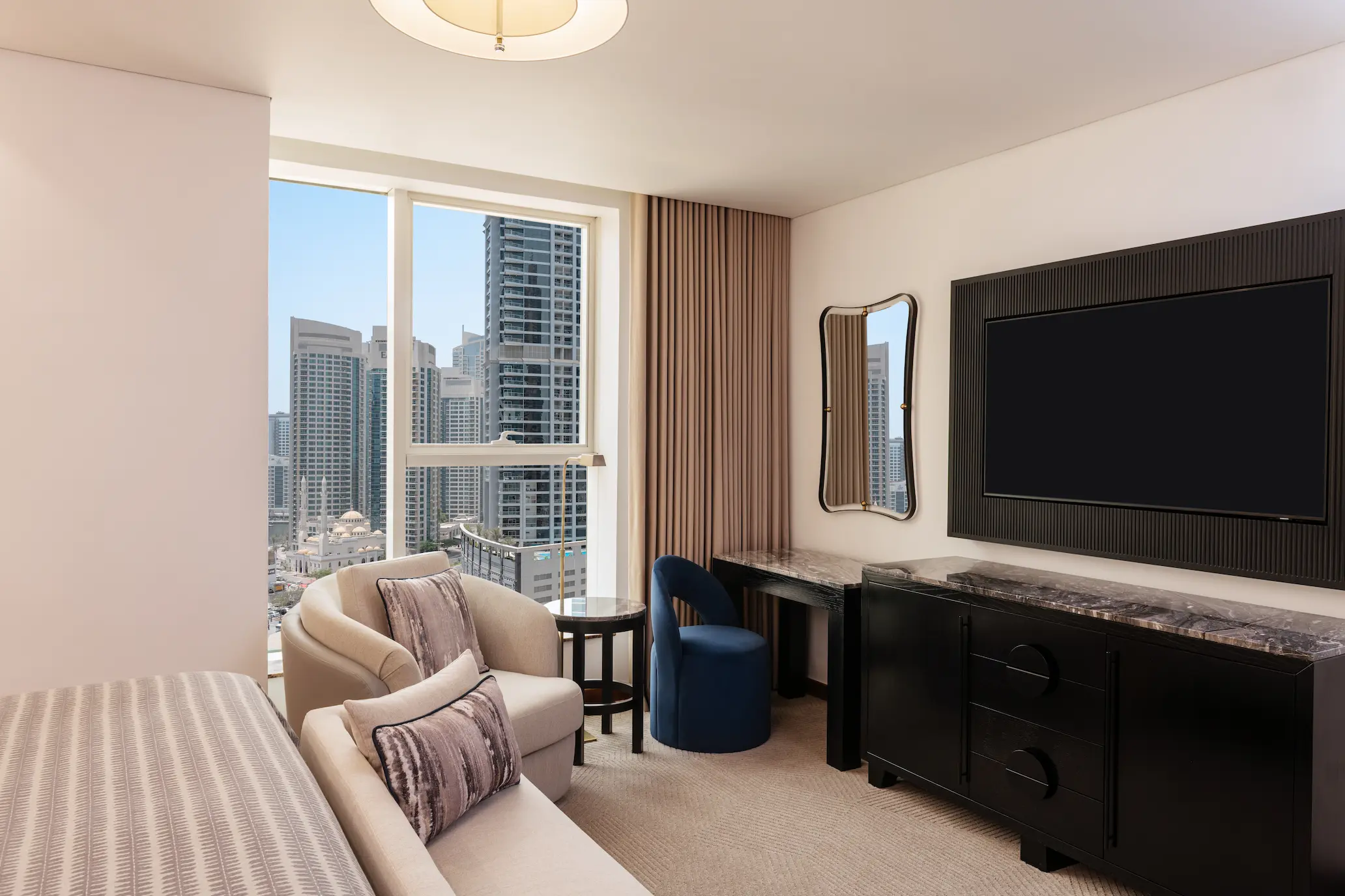 grosvenor house dubai deluxe suite bedroom view showcasing refined luxury styling and an elegant spacious layout