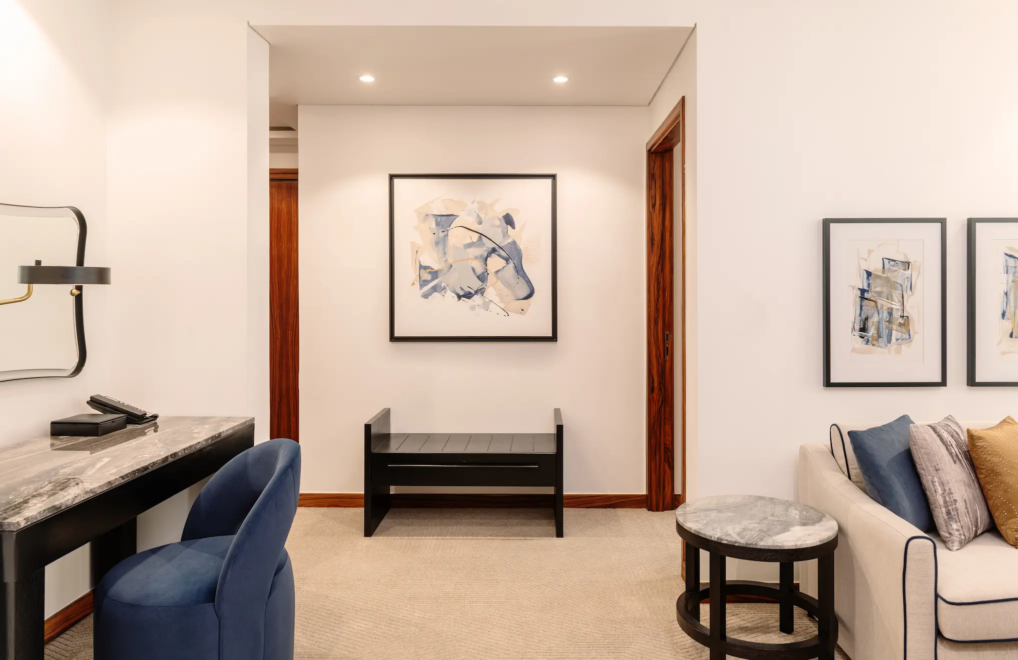 grosvenor house dubai deluxe suite desk featuring an elegant workspace with refined luxury finishes