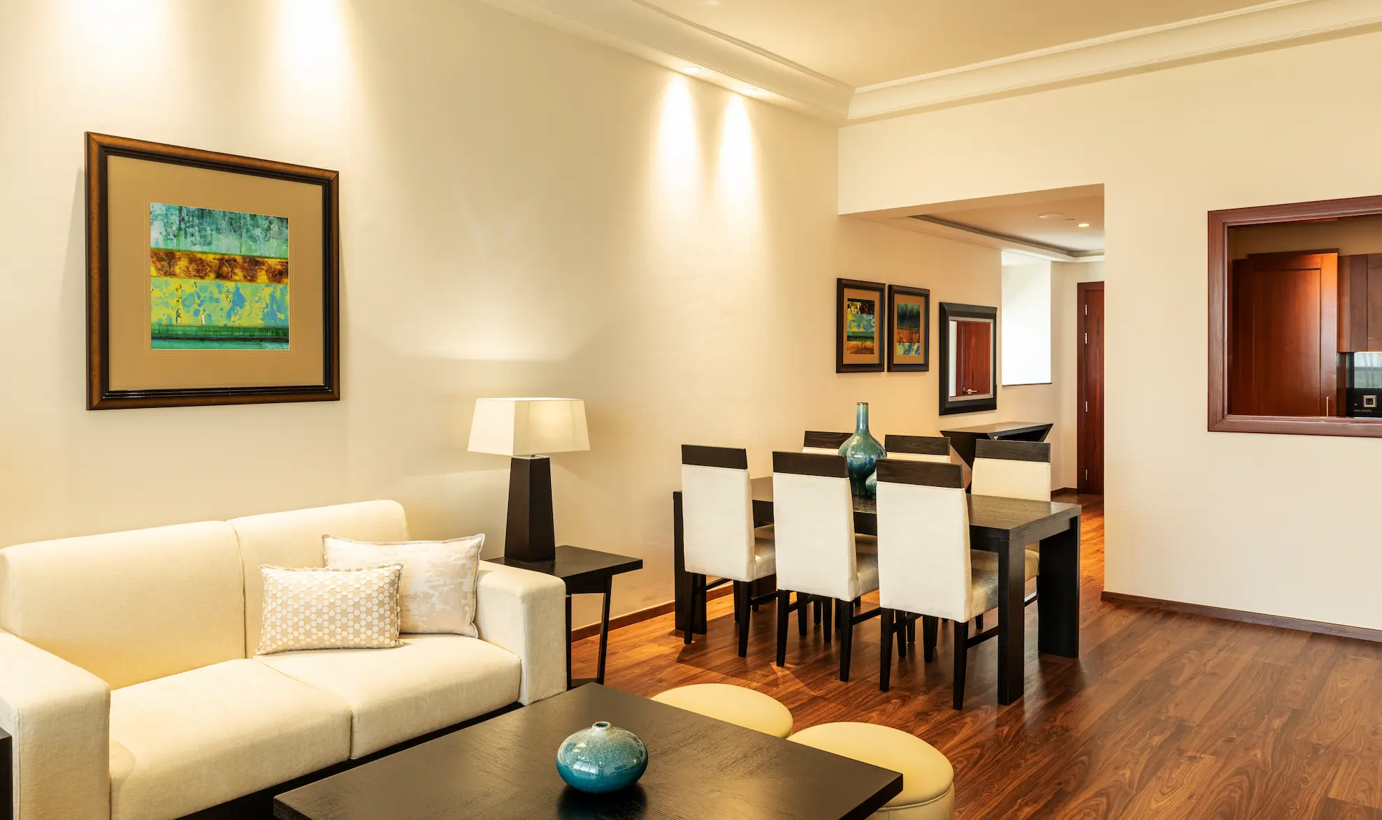 grosvenor house dubai one bed apartment lounge dining area featuring refined luxury seating and an elegant open plan layout