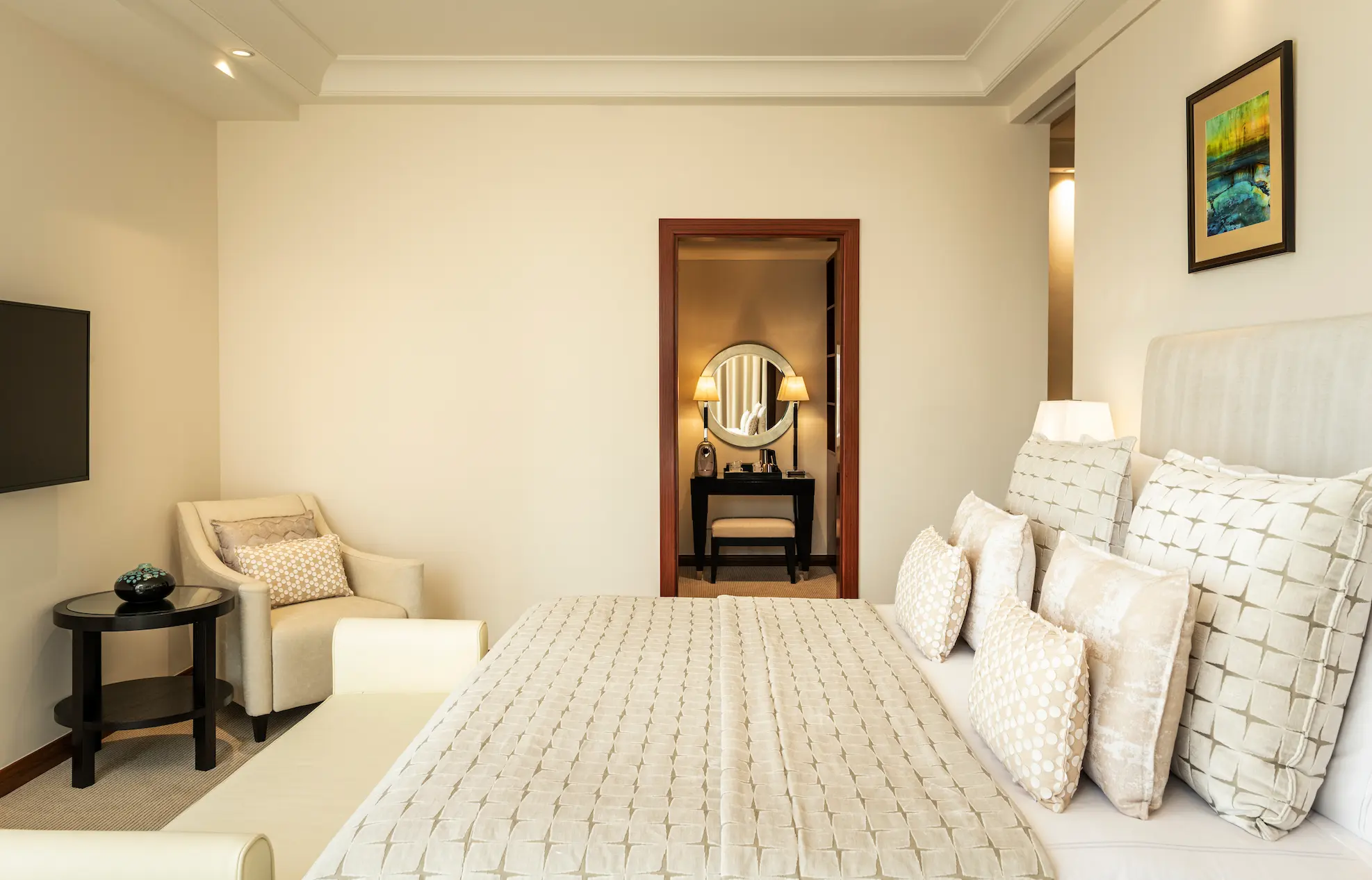 grosvenor house dubai premier suite king bed featuring refined luxury finishes and elegant contemporary styling