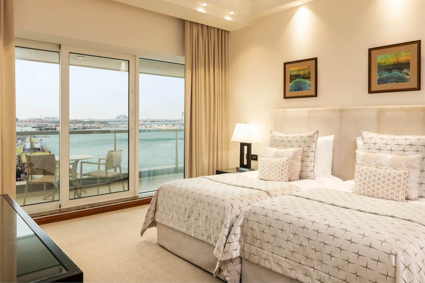 grosvenor house dubai premiere suite twin bed featuring refined luxury finishes and elegant contemporary styling