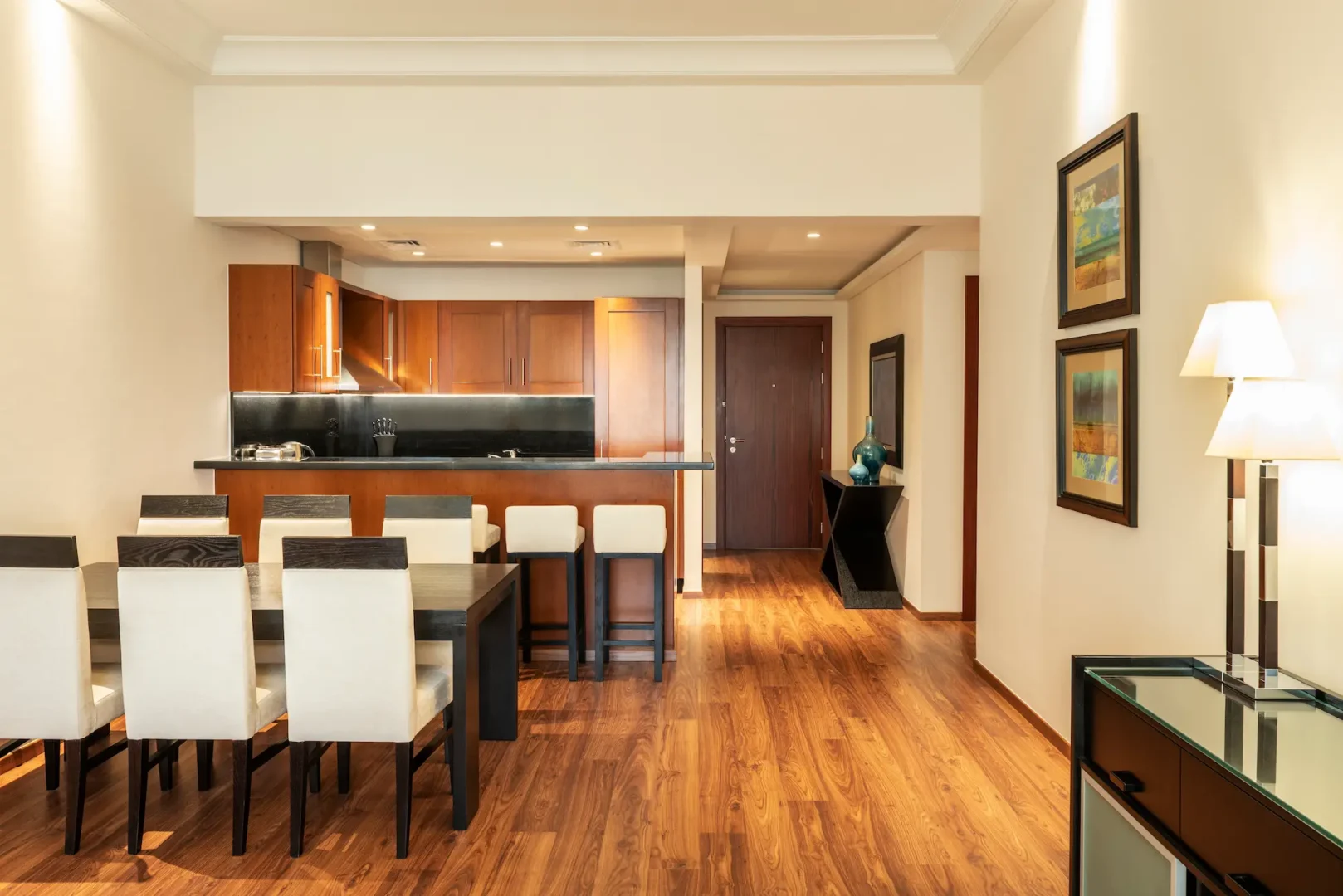 grosvenor house dubai two bed apartment dining area featuring refined luxury furnishings and an elegant open plan layout