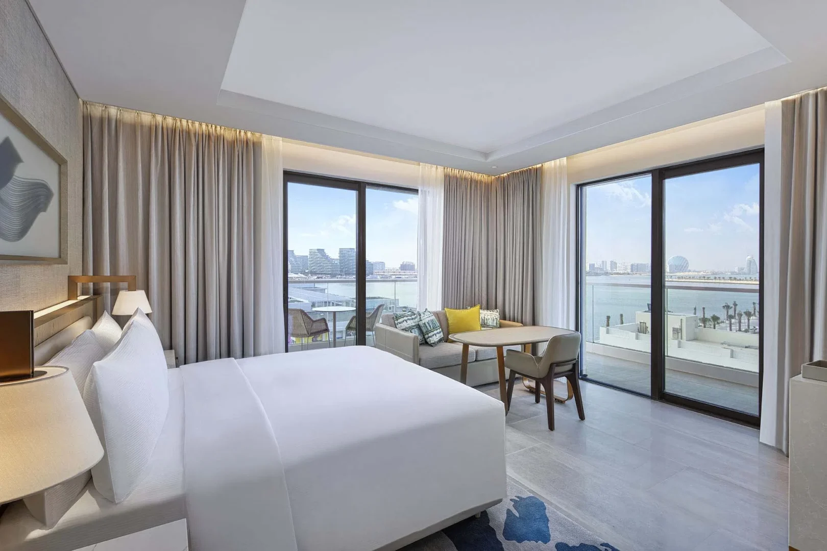 hilton abu dhabi yas island king deluxe room bed interior with bay view