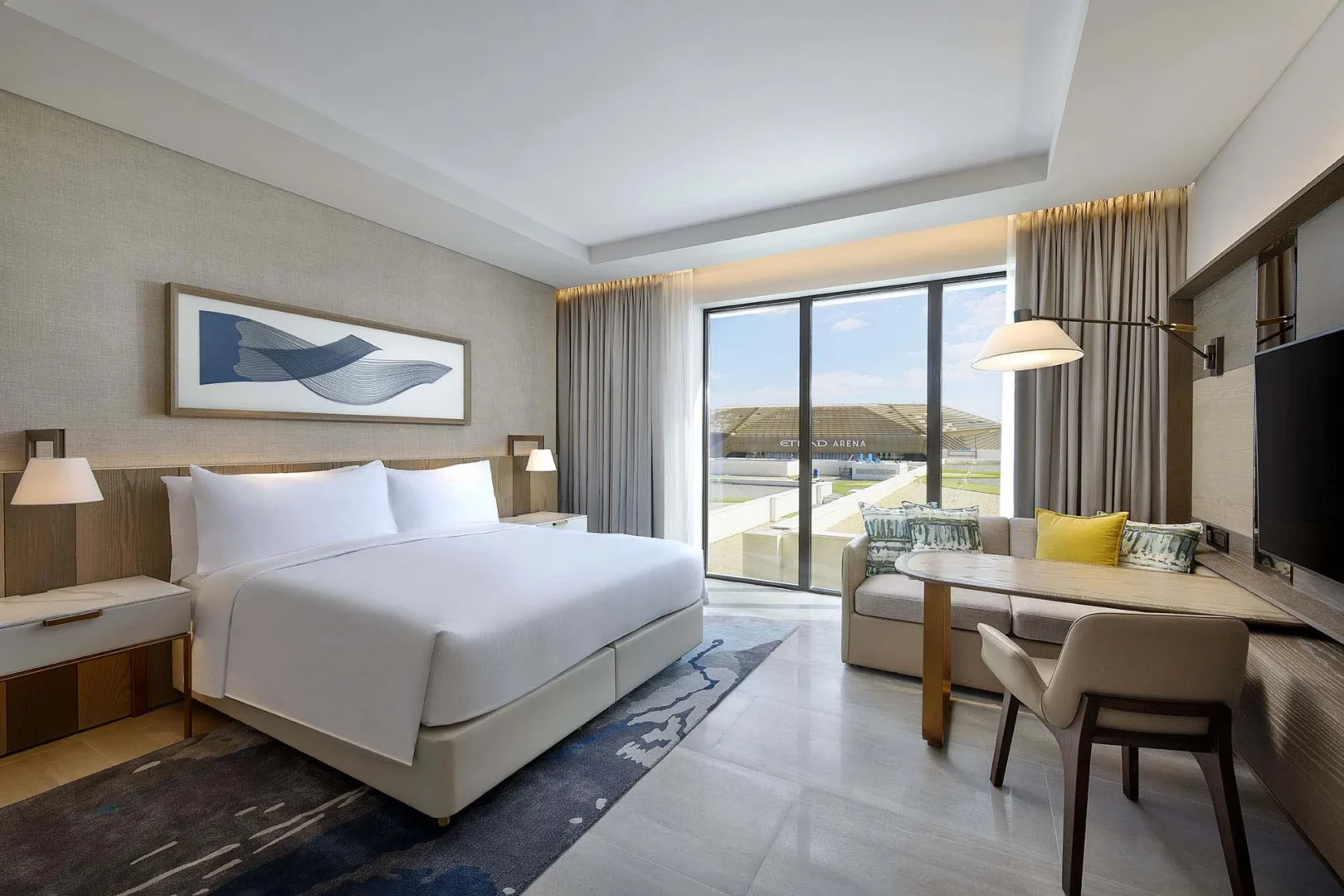 hilton abu dhabi yas island king guest room bedroom with theme park view