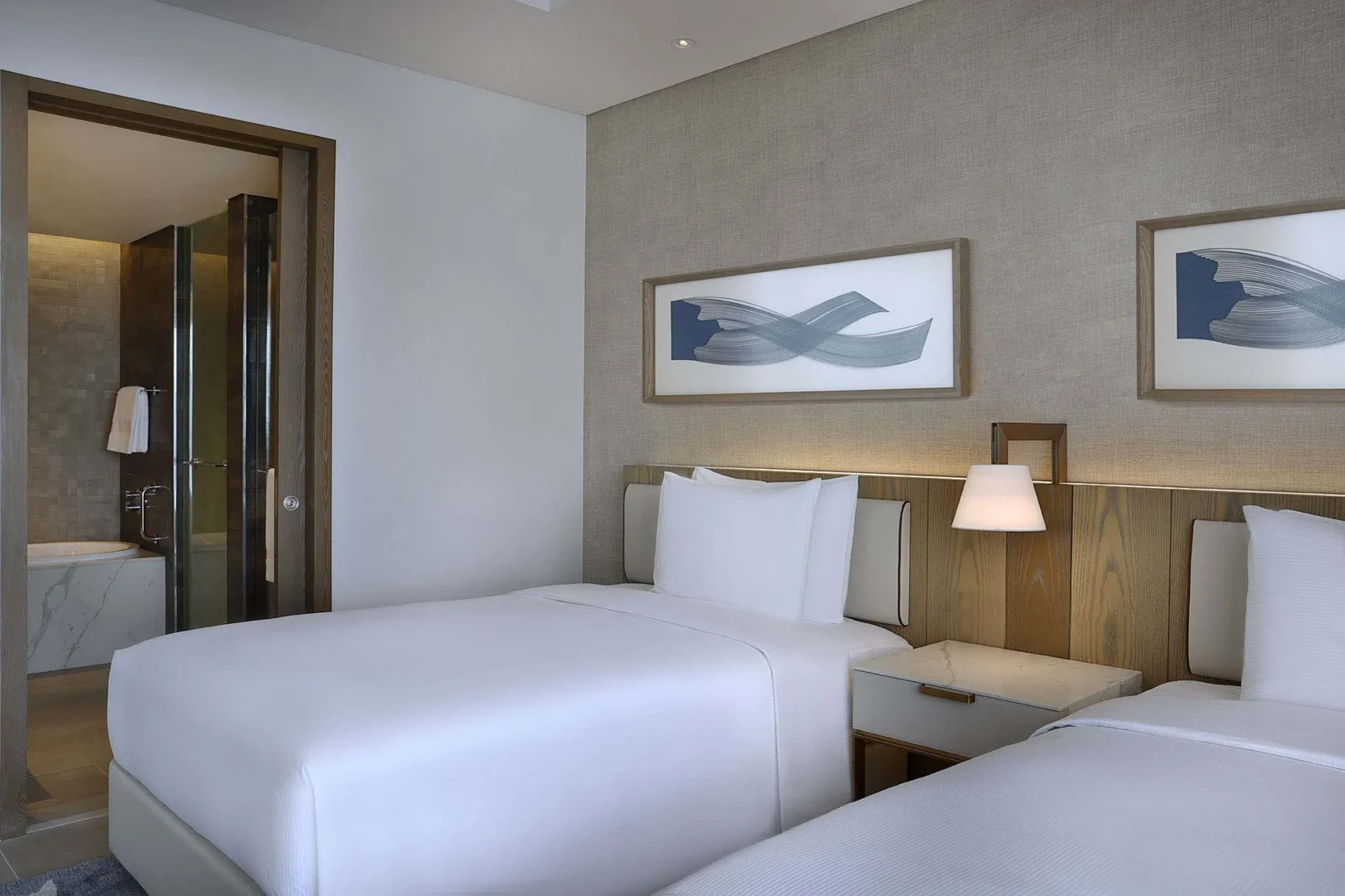 hilton abu dhabi yas island two double bed deluxe room interior