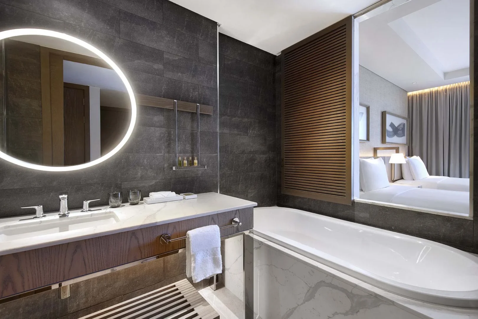 hilton abu dhabi yas island two double bed guest bathroom interior