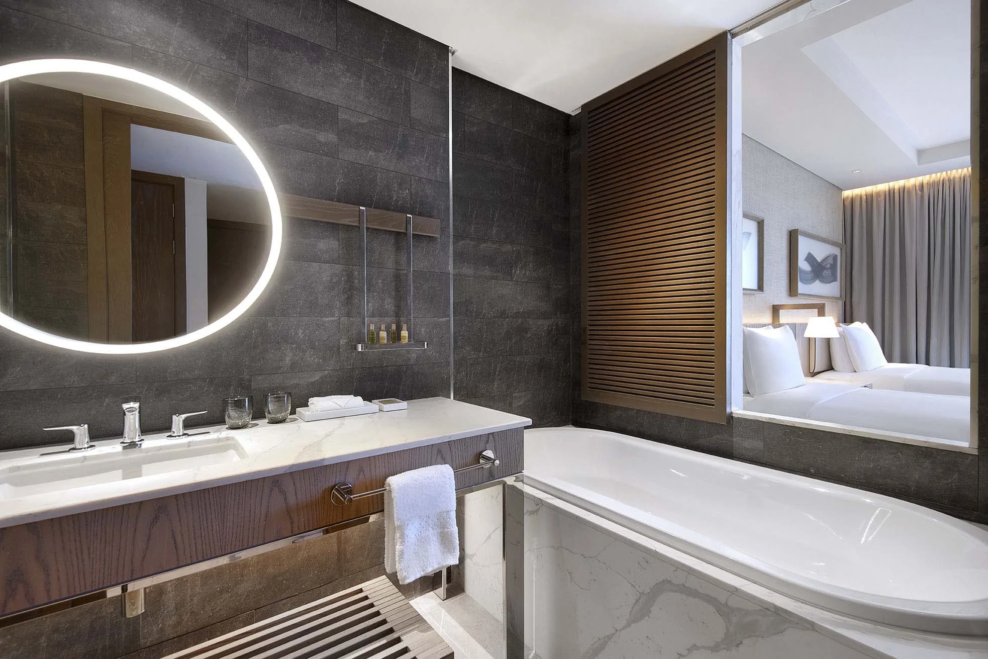 hilton abu dhabi yas island two double bed guest bathroom interior