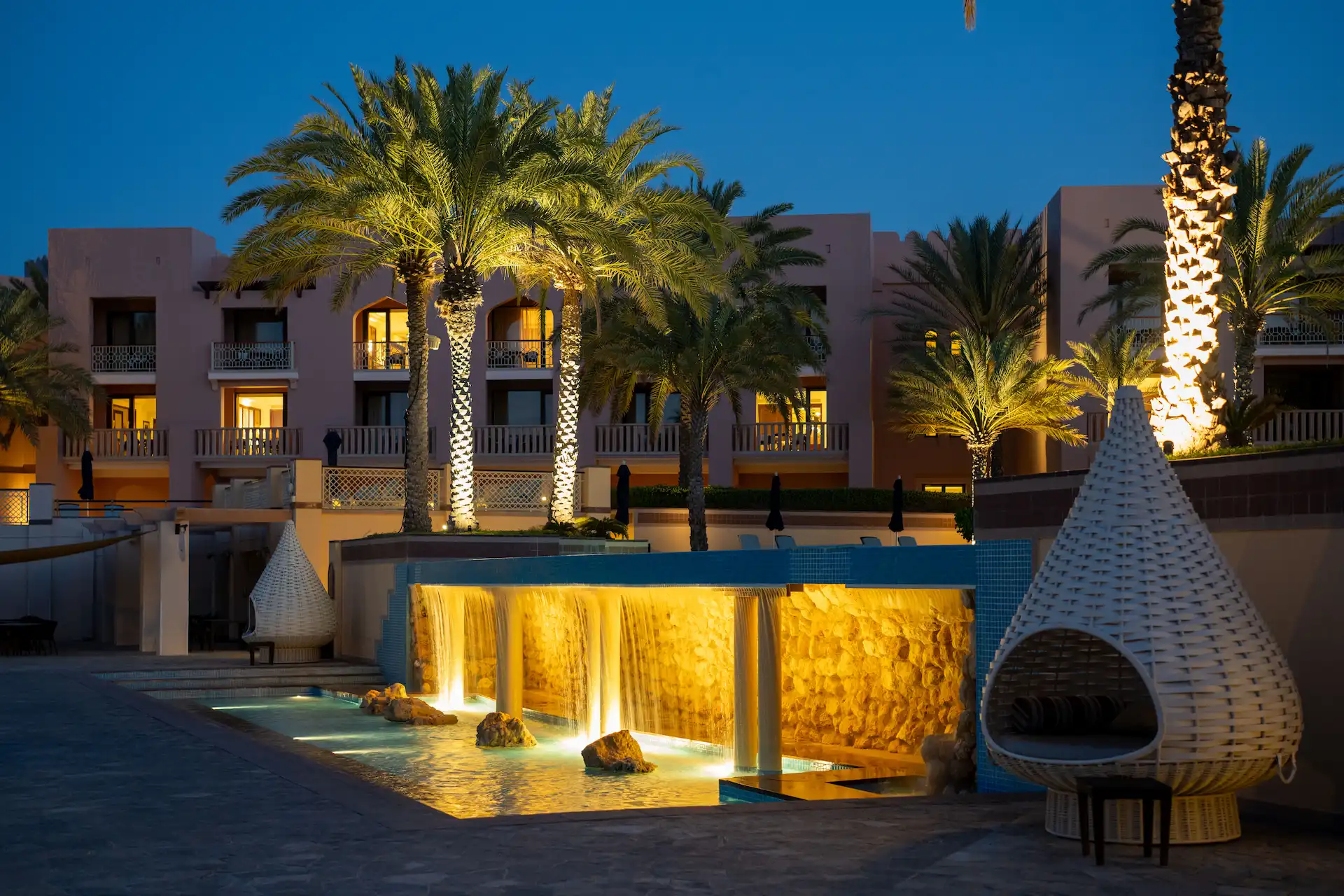 infinity pool at night al husn hotel muscat oman