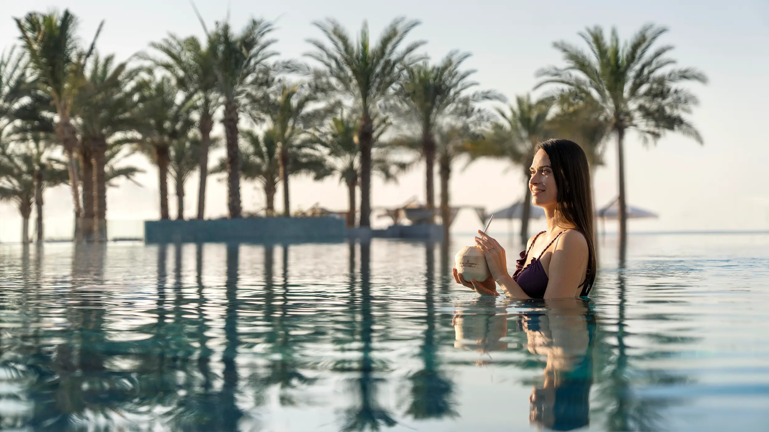 intercontinental ras al khaimah resort spa infinity pool showcasing a serene pool experience overlooking the coastline