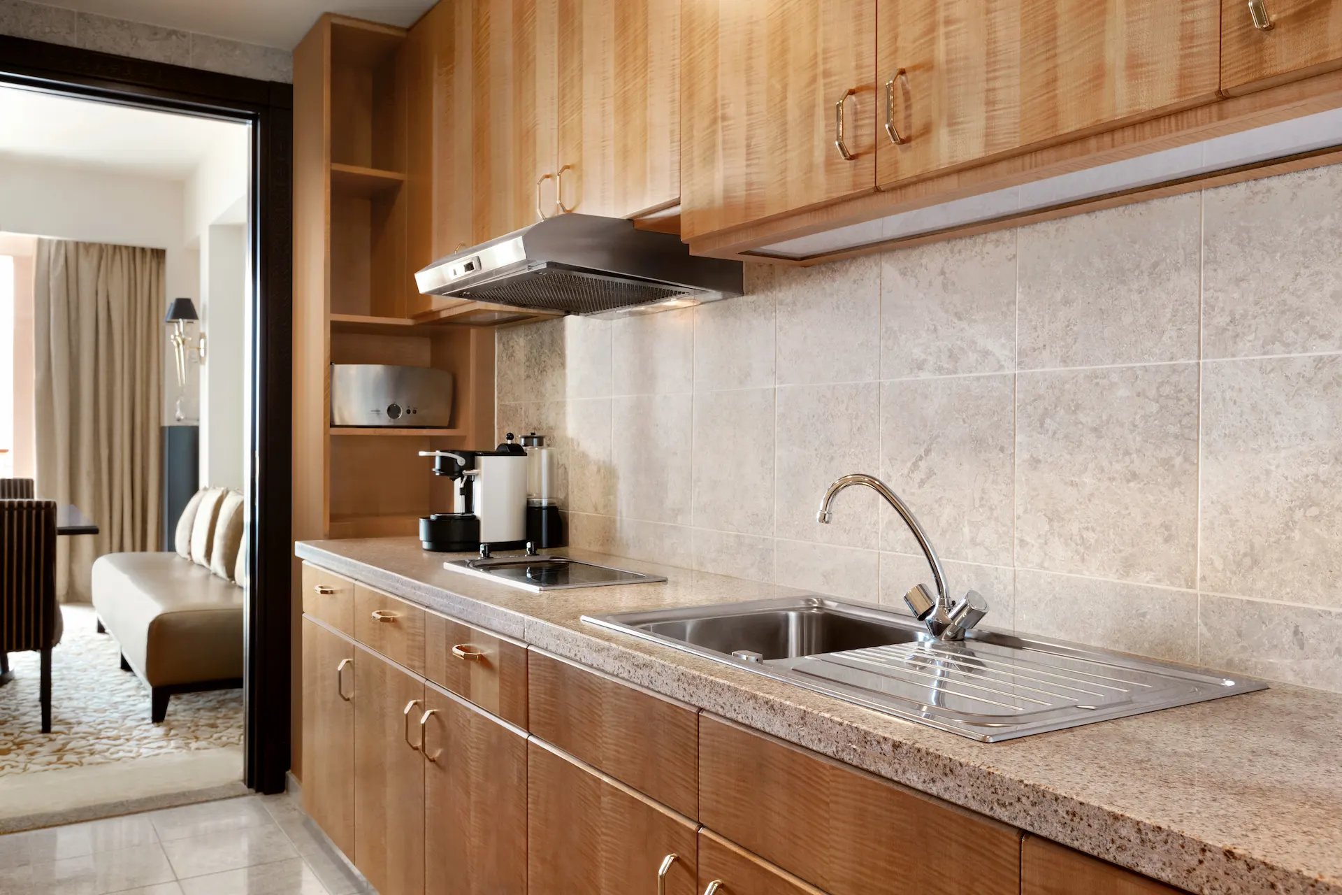 kitchen deluxe one suite with sea view al husn hotel muscat oman
