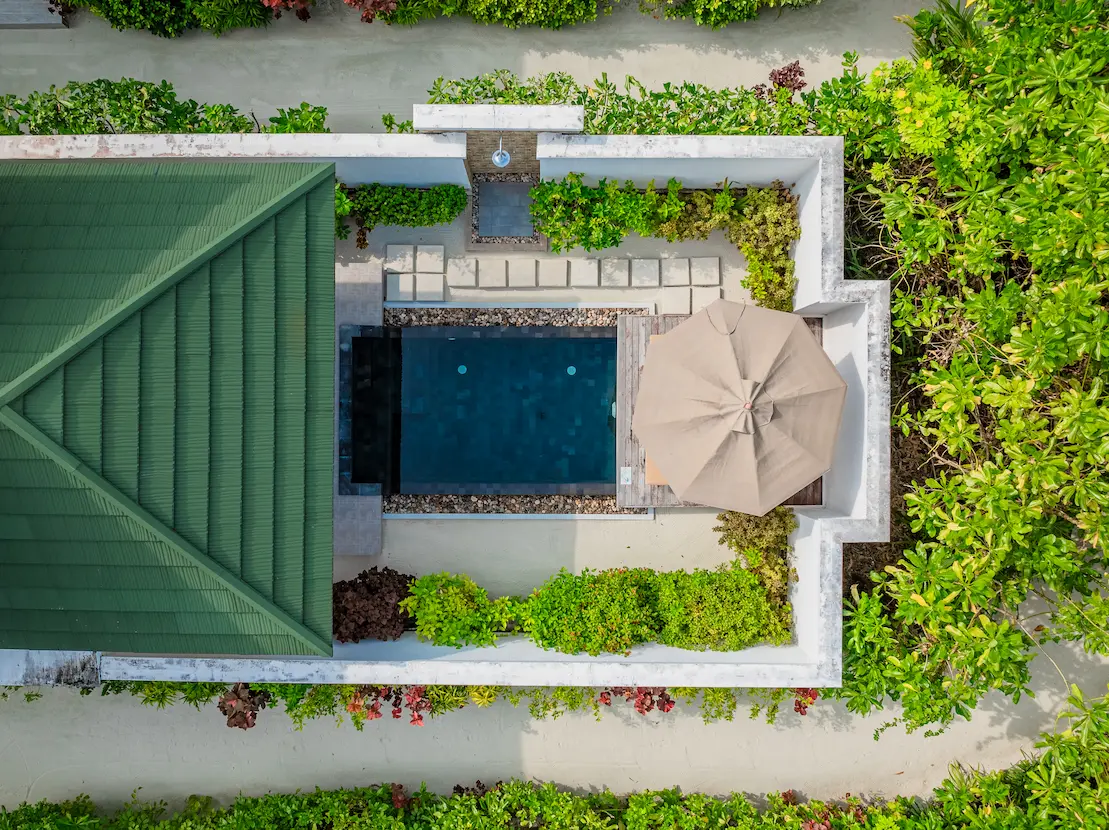 siyam world maldives beach residence with pool aerial view showcasing private beachfront luxury
