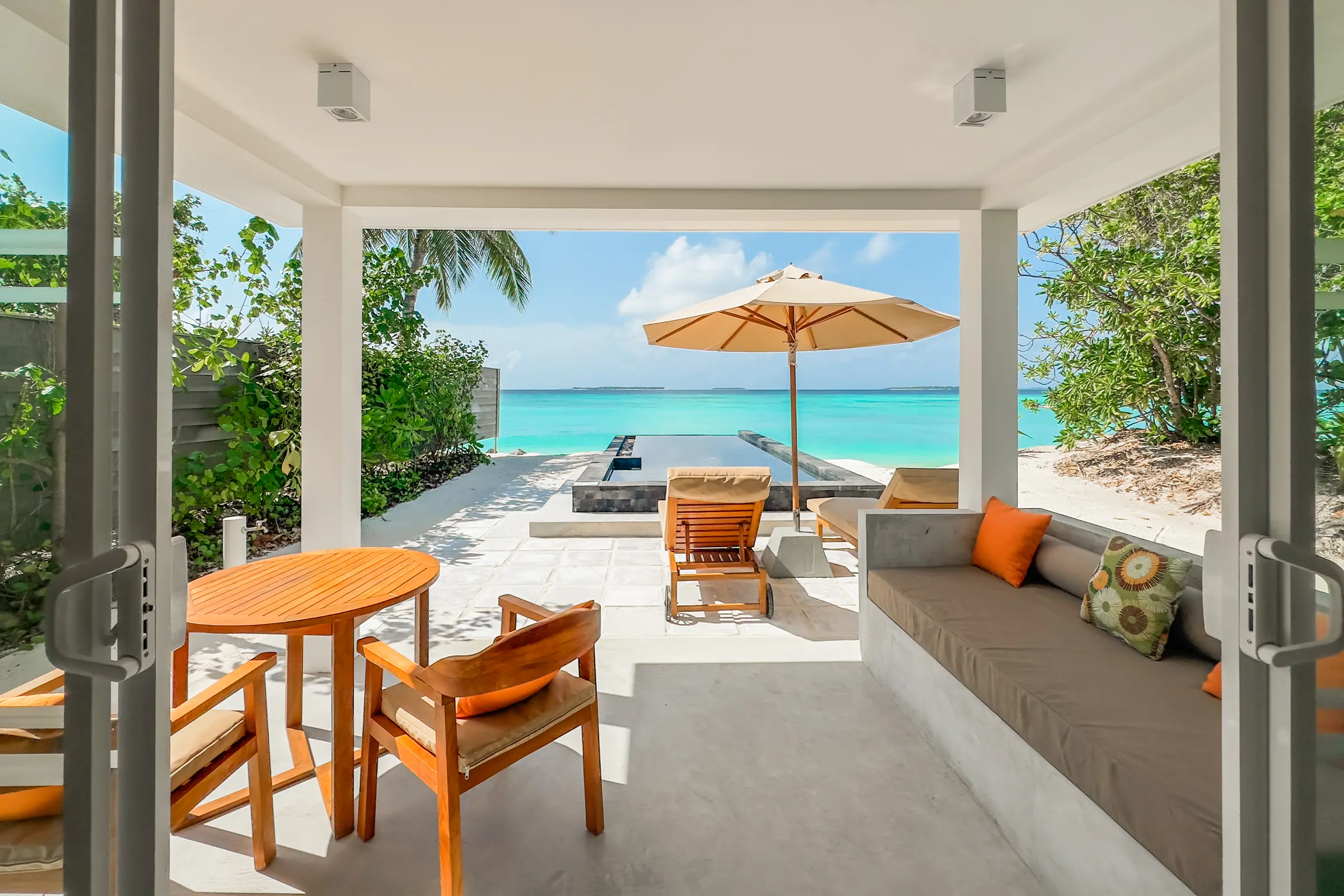 siyam world maldives beach suite with pool pool deck offering private beachfront luxury