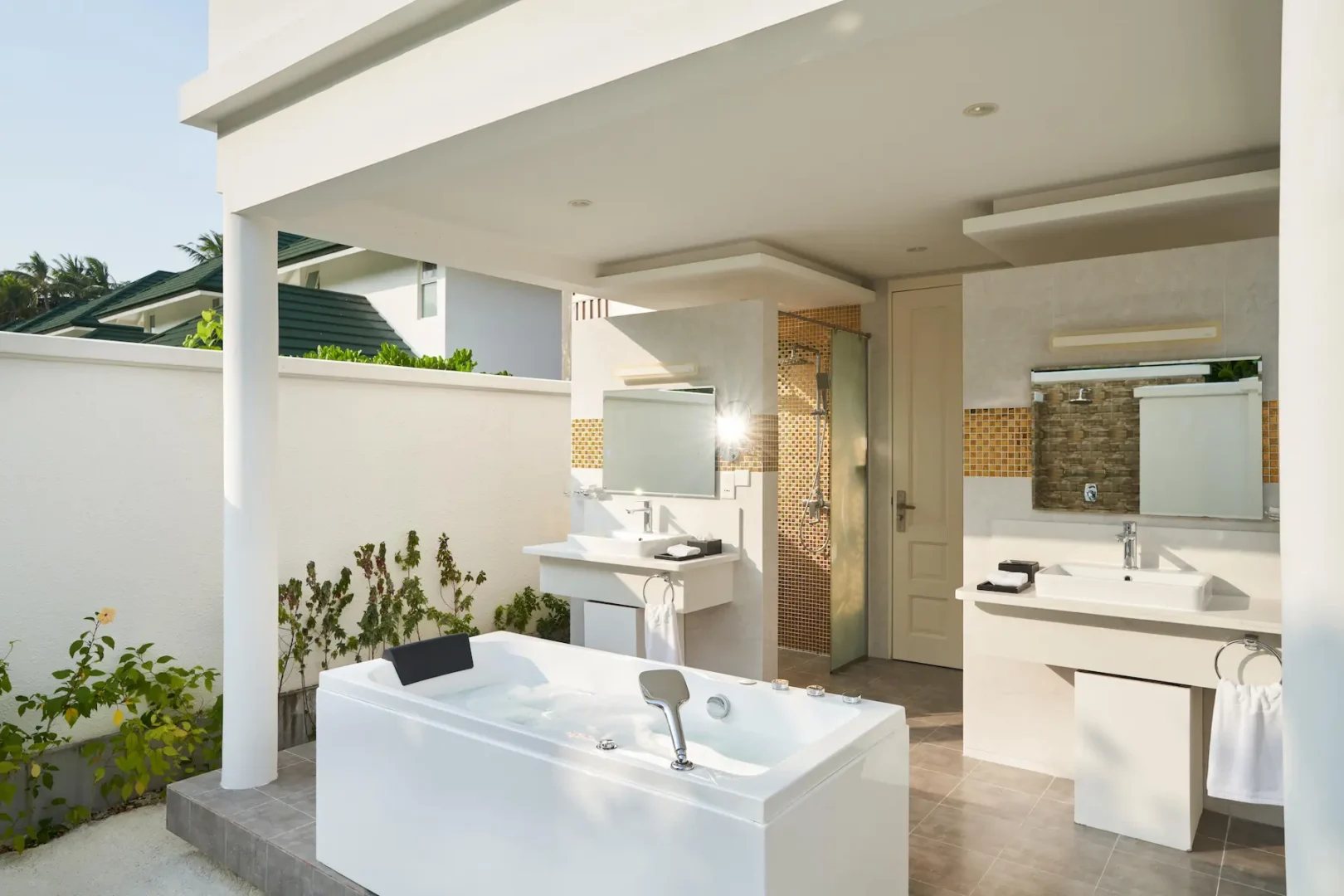siyam world maldives four bedroom beach residence with pool bathroom featuring elegant spacious beachfront luxury