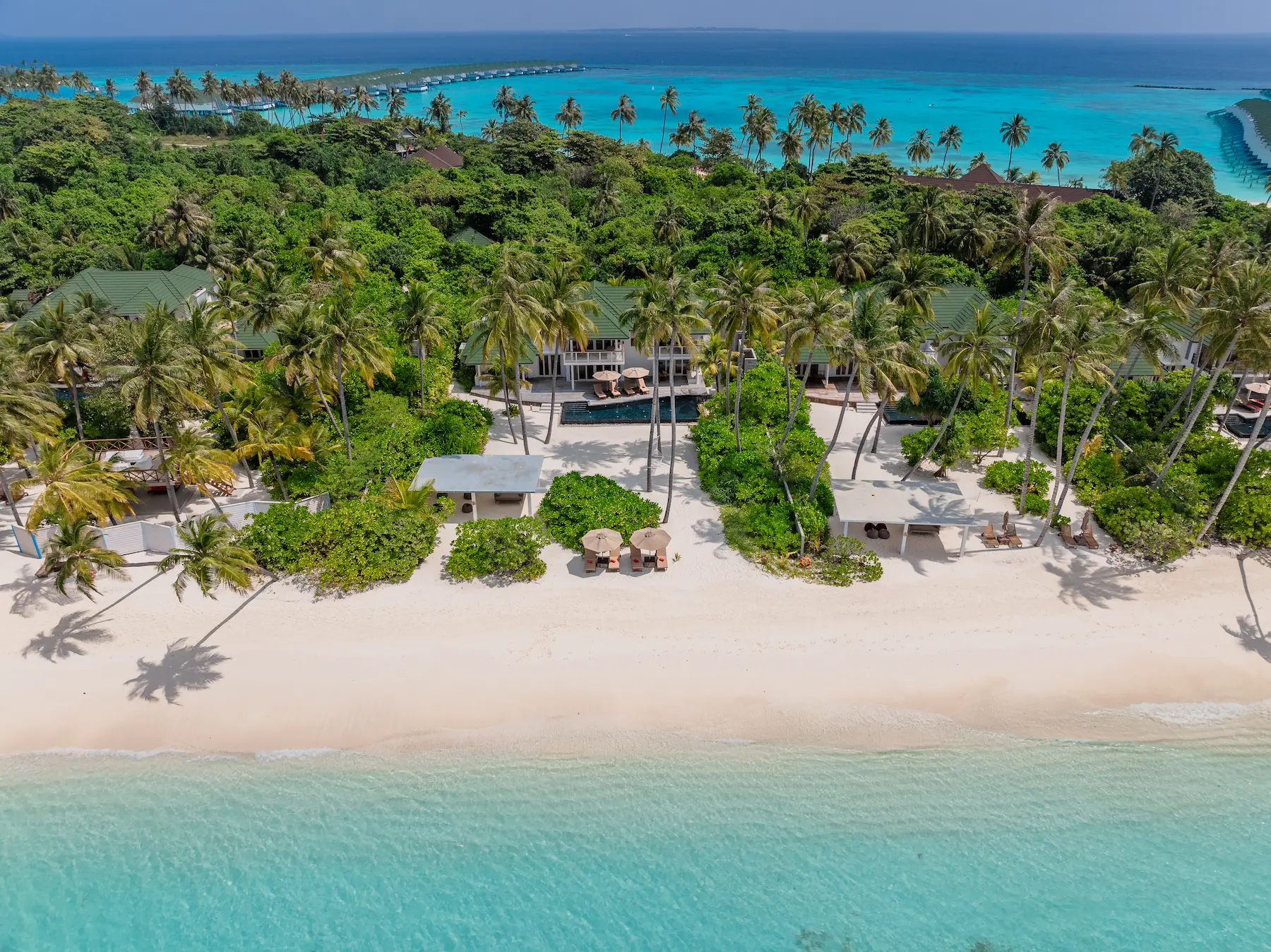 siyam world maldives four bedroom beach residence with pool exterior showcasing expansive private beachfront luxury
