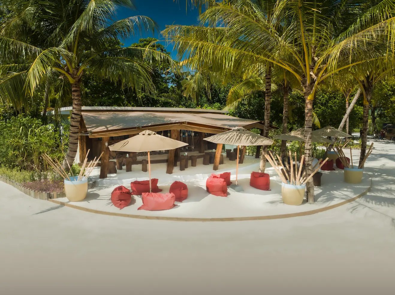 siyam world maldives good vibrations beach bar offering relaxed island tunes with oceanfront seating and tropical coastal ambience