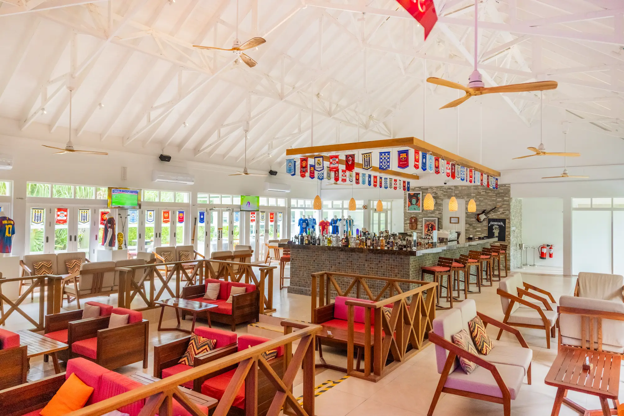 siyam world maldives kulhivaru sports bar offering vibrant island energy with big screen entertainment and relaxed social seating