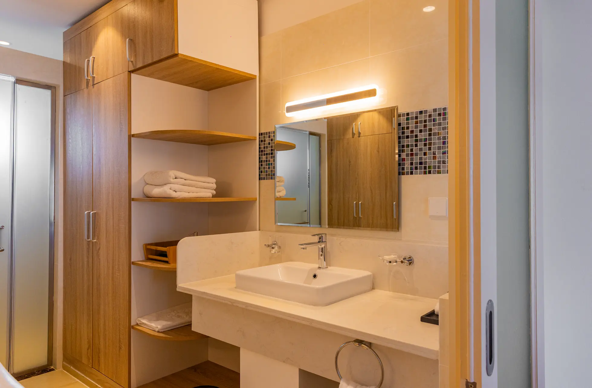 siyam world maldives lagoon villa with pool slide bathroom interior showcasing refined overwater luxury