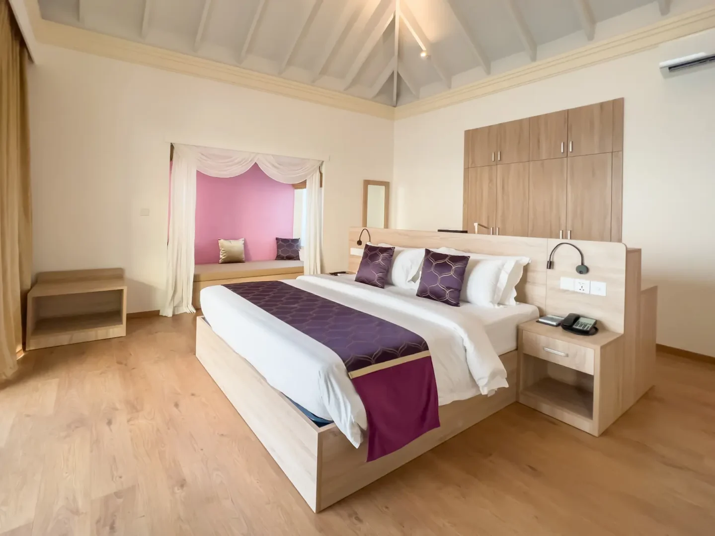 siyam world maldives ocean villa with pool slide bedroom offering serene overwater luxury