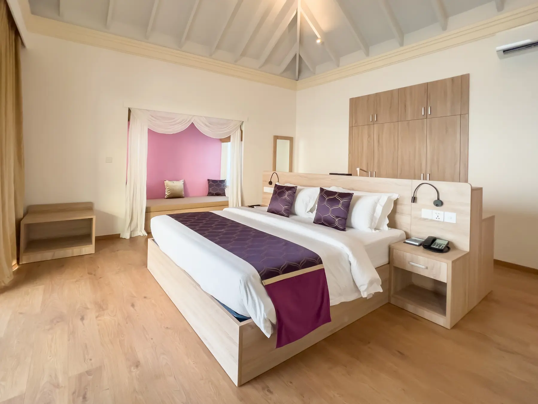 siyam world maldives ocean villa with pool slide bedroom offering serene overwater luxury