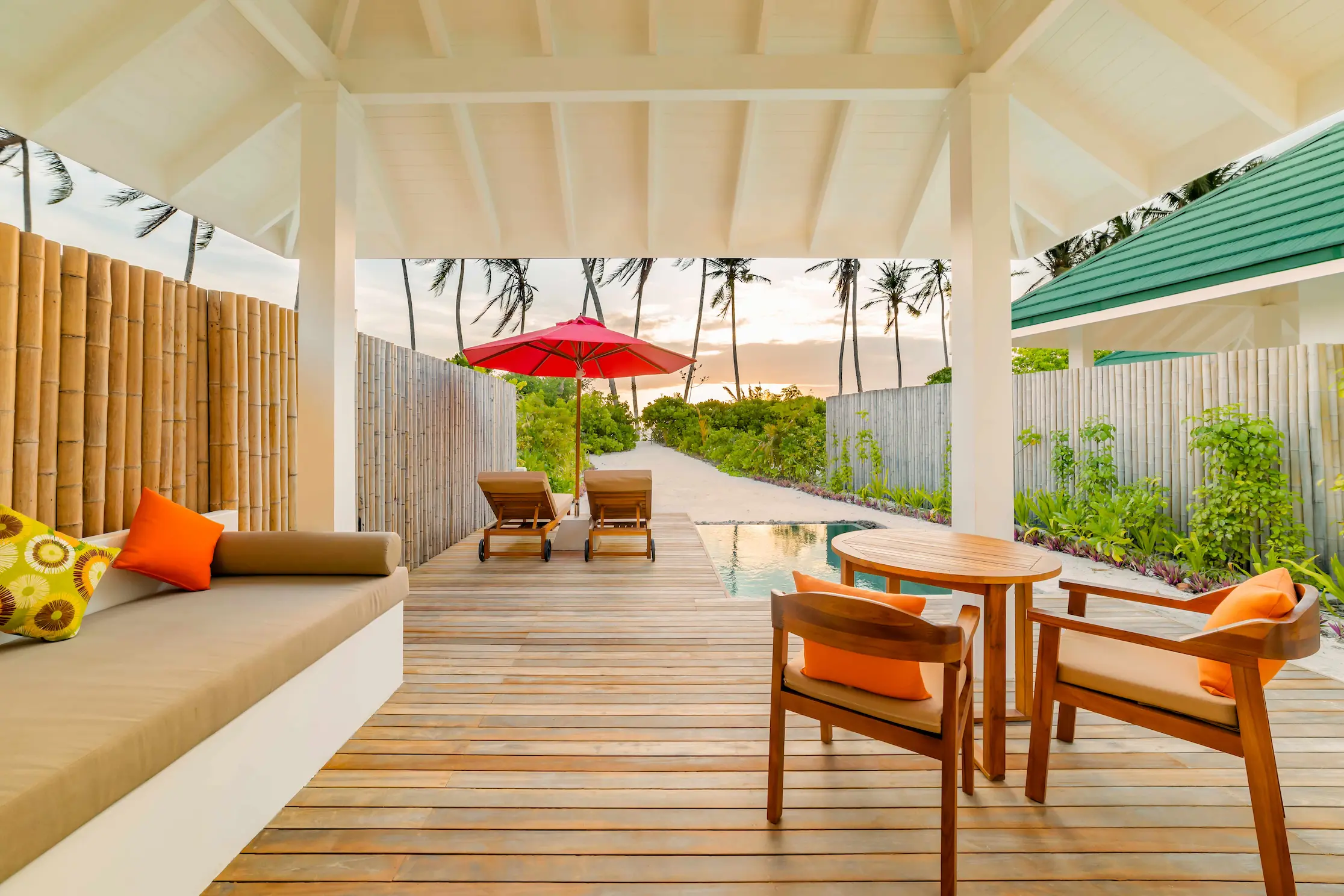 siyam world maldives sunset pool beach villa outdoor terrace with private coastal luxury setting
