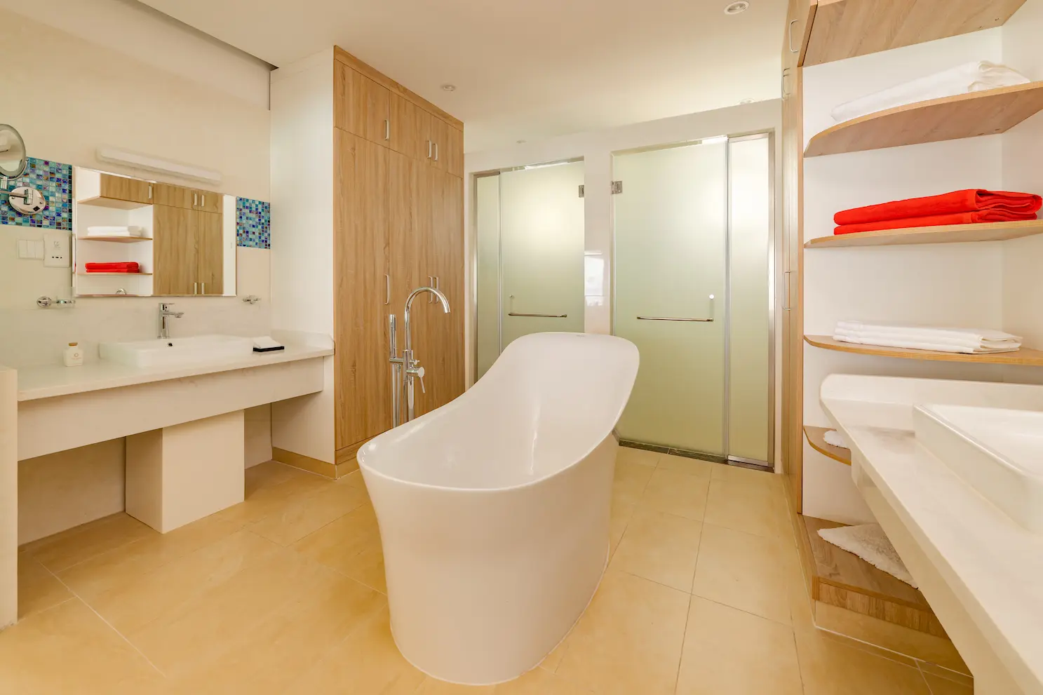 siyam world maldives three bedroom lagoon villa with pool slide bathroom featuring refined overwater luxury