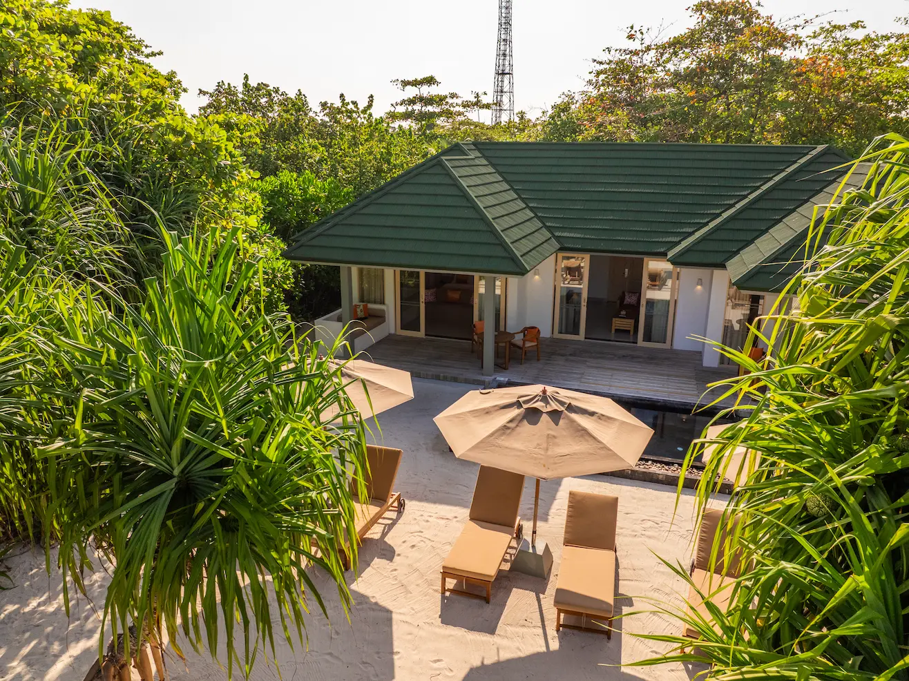 siyam world maldives three bedroom pool beach villa exterior showcasing private beachfront luxury
