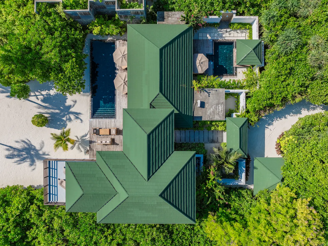 siyam world maldives two bedroom beach residence with pool aerial view showcasing private beachfront luxury