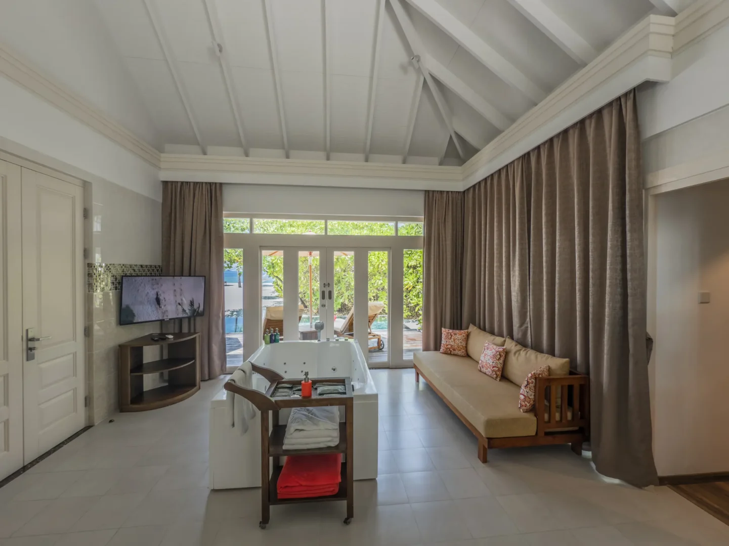 siyam world maldives two bedroom beach residence with pool bathtub offering serene tropical luxury