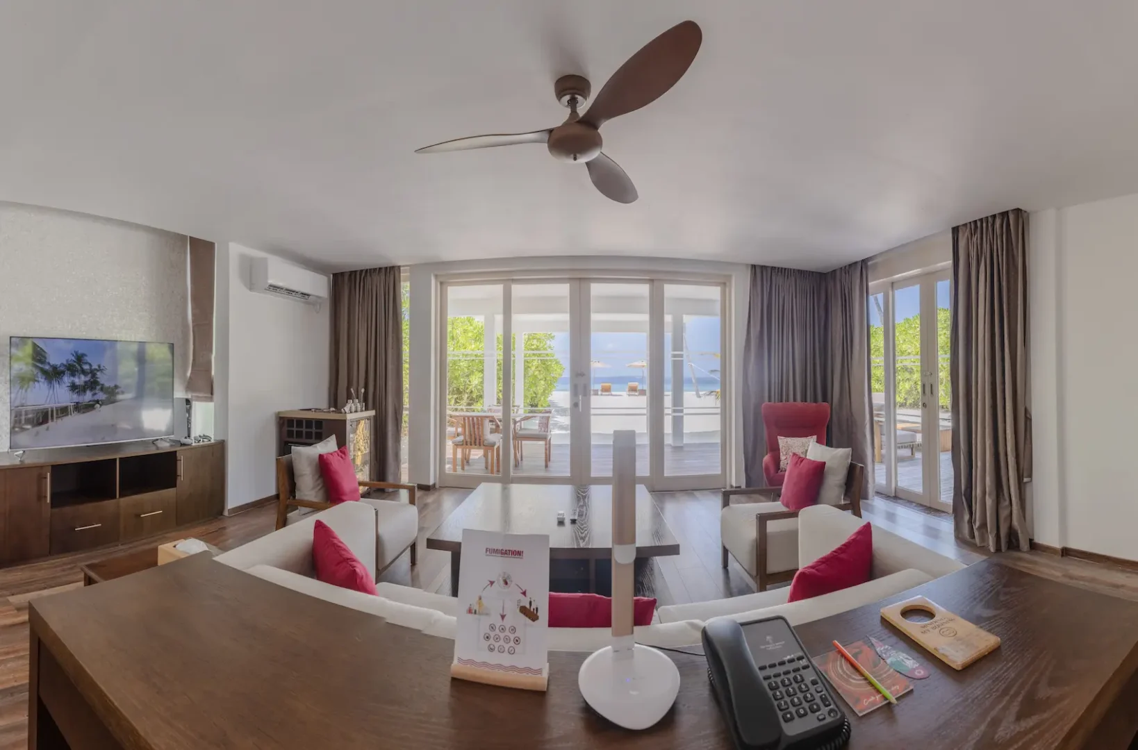 siyam world maldives two bedroom beach residence with pool living area featuring spacious tropical luxury