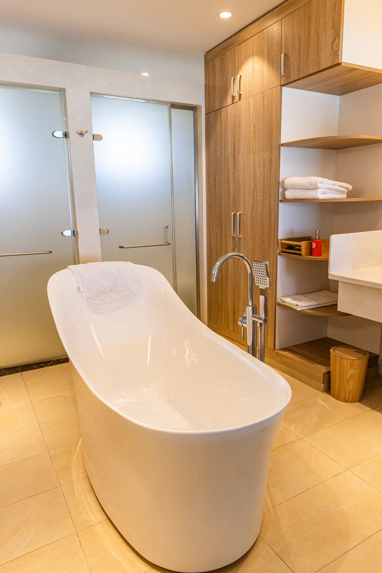 siyam world maldives two bedroom lagoon villa with pool slide bathtub offering serene overwater luxury