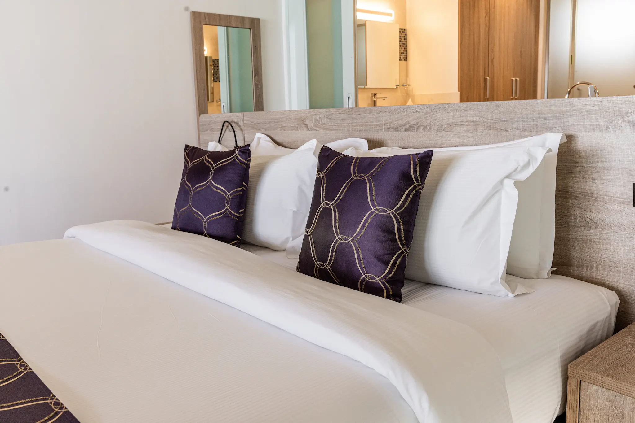 siyam world maldives two bedroom lagoon villa with pool slide bed showcasing refined overwater luxury