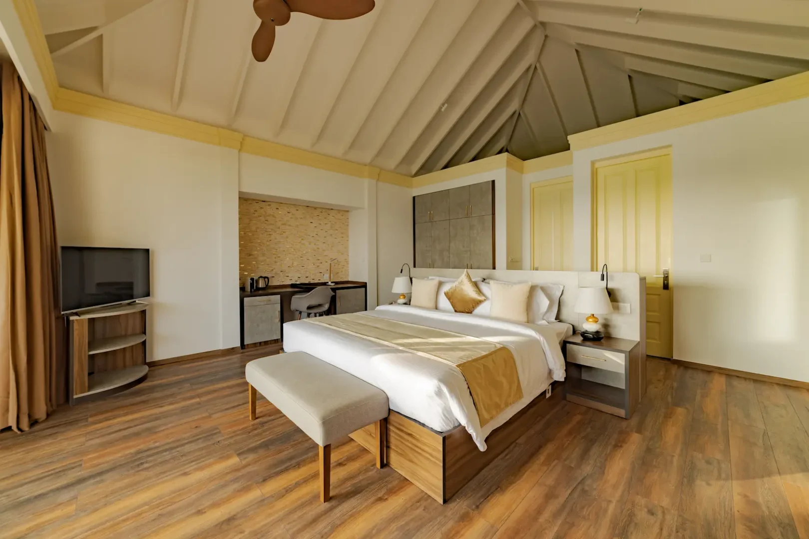 siyam world maldives two storey pool beach residence bedroom with refined tropical luxury interior