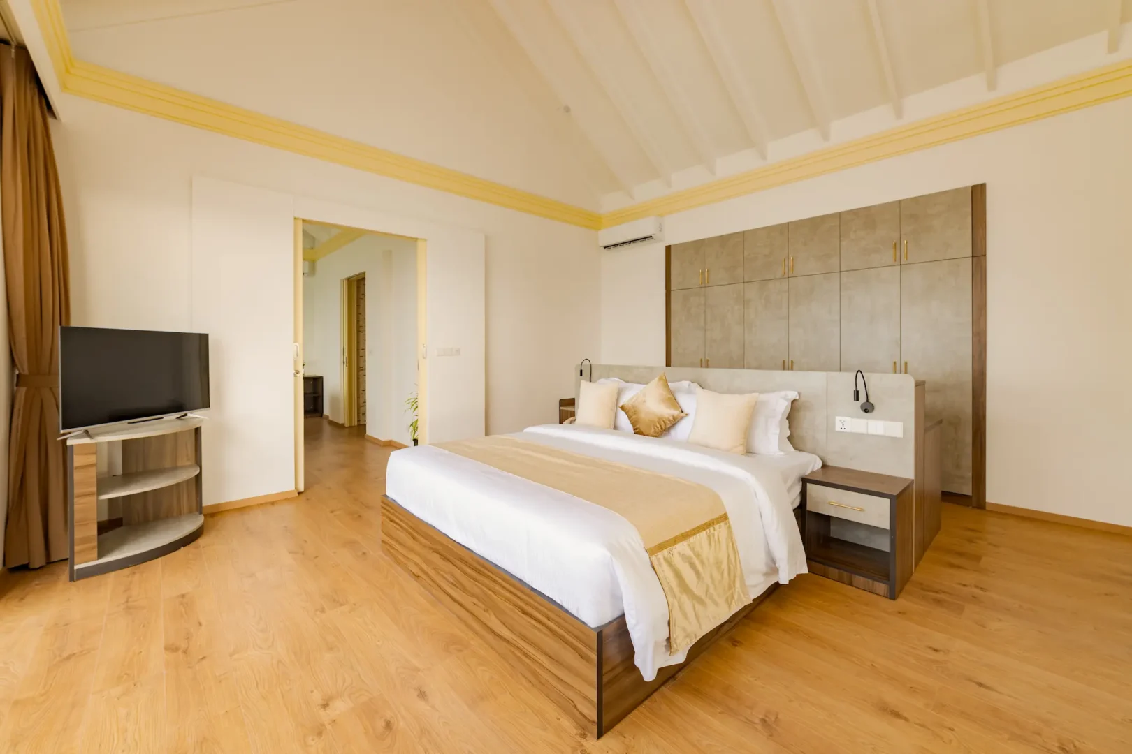 siyam world maldives water pavilion bedroom with refined overwater luxury interior