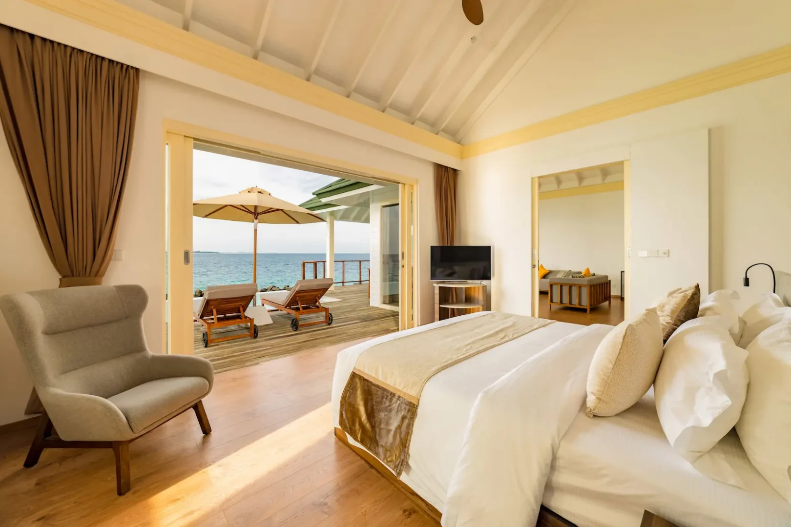 siyam world maldives water pavilion bedroom view showcasing refined overwater luxury