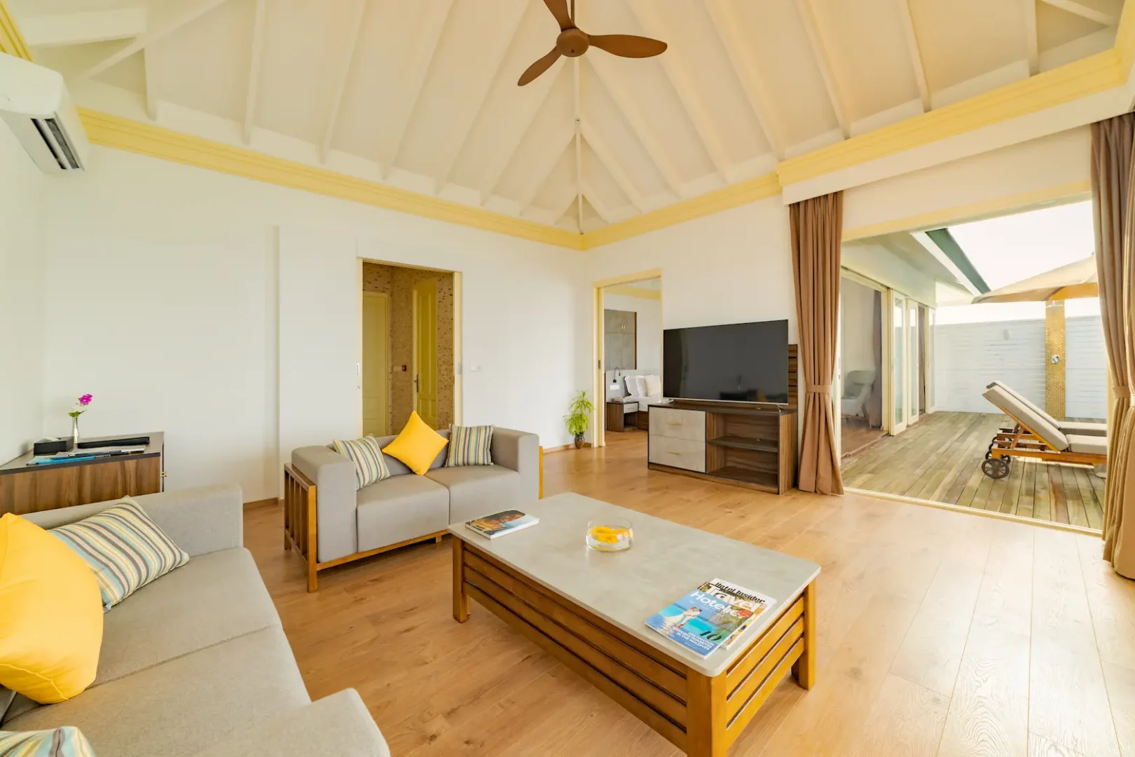 siyam world maldives water pavilion living area with elegant overwater luxury design