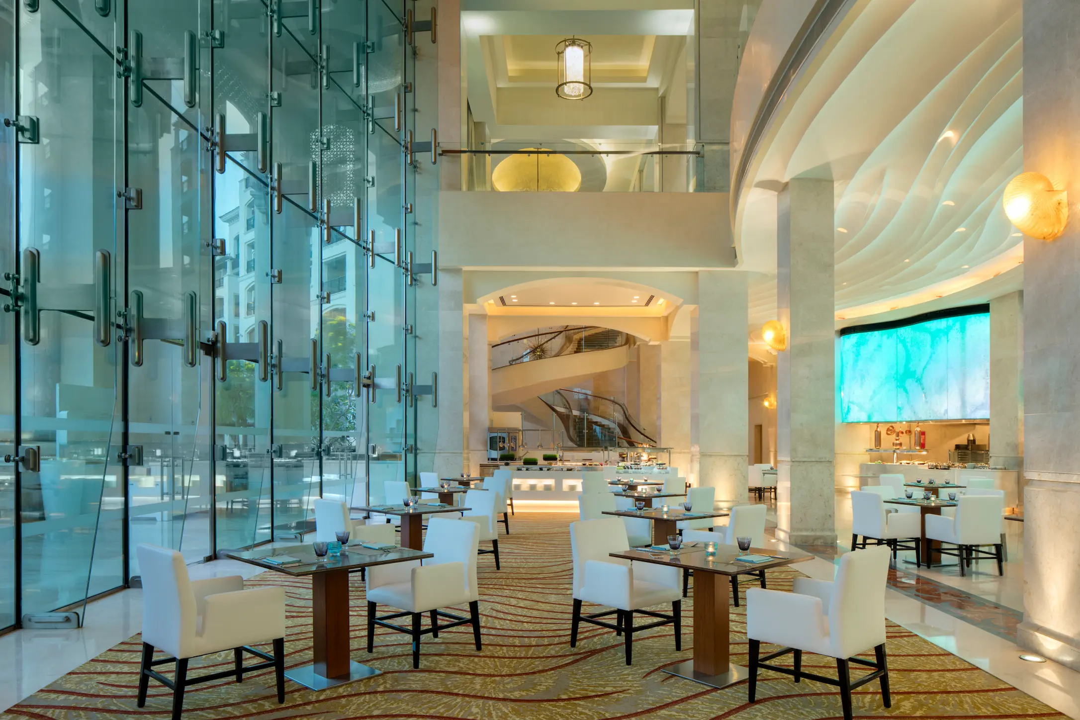 st regis saadiyat island abu dhabi olea restaurant evening ambience