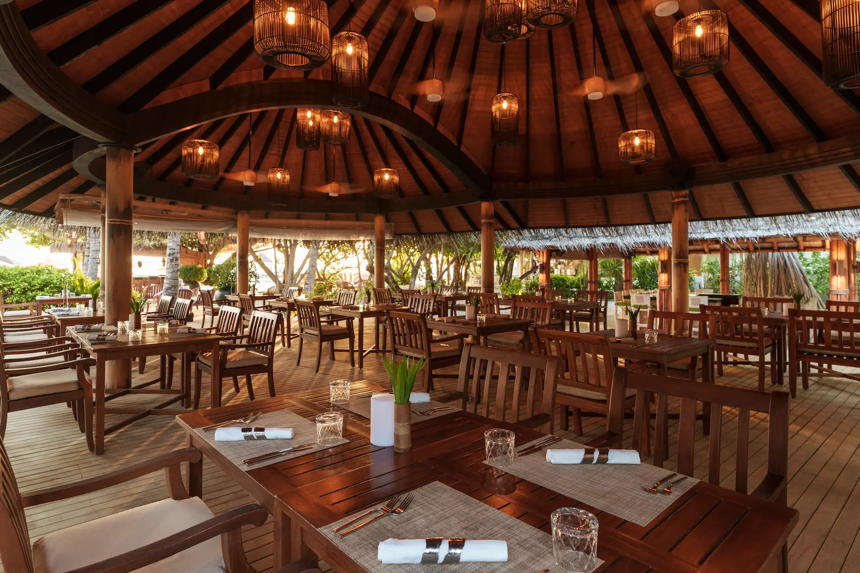 luxury bamboo restaurant interior and exterior at sun siyam iru fushi maldives island dining experience