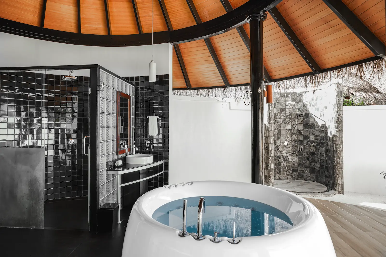 luxury deluxe beach villa bathtub at sun siyam iru fushi maldives private beachfront accommodation