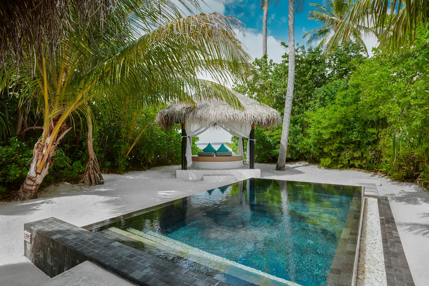 luxury deluxe beach villa with pool cabana at sun siyam iru fushi maldives private beachfront accommodation
