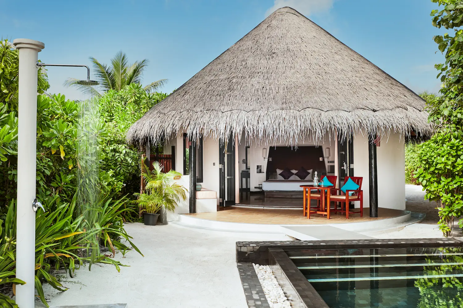 luxury deluxe beach villa with pool exterior at sun siyam iru fushi maldives private beachfront accommodation