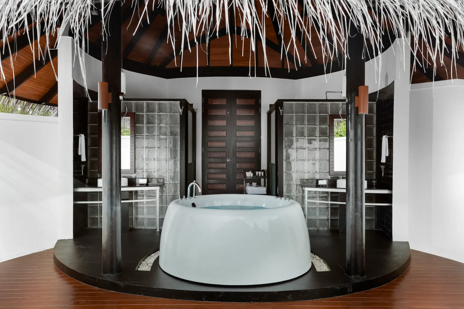 luxury deluxe family beach villa bathroom at sun siyam iru fushi maldives private beachfront accommodation