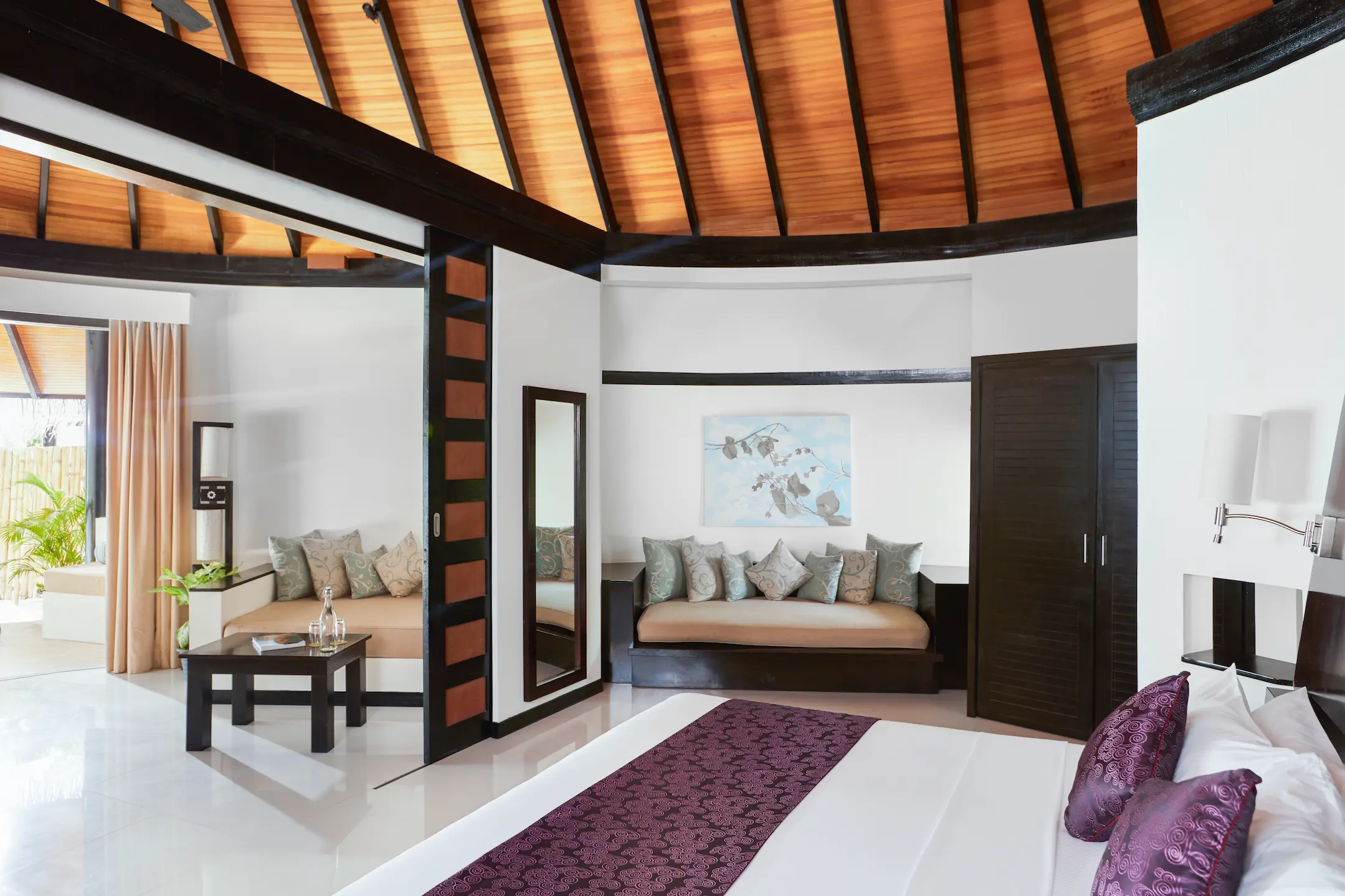 luxury deluxe family beach villa interior at sun siyam iru fushi maldives private beachfront accommodation