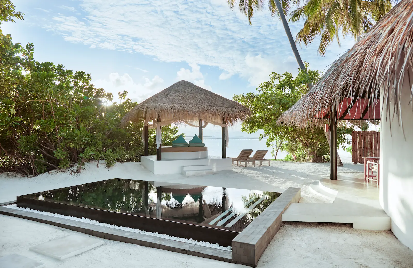 luxury deluxe family beach villa pool at sun siyam iru fushi maldives private beachfront accommodation