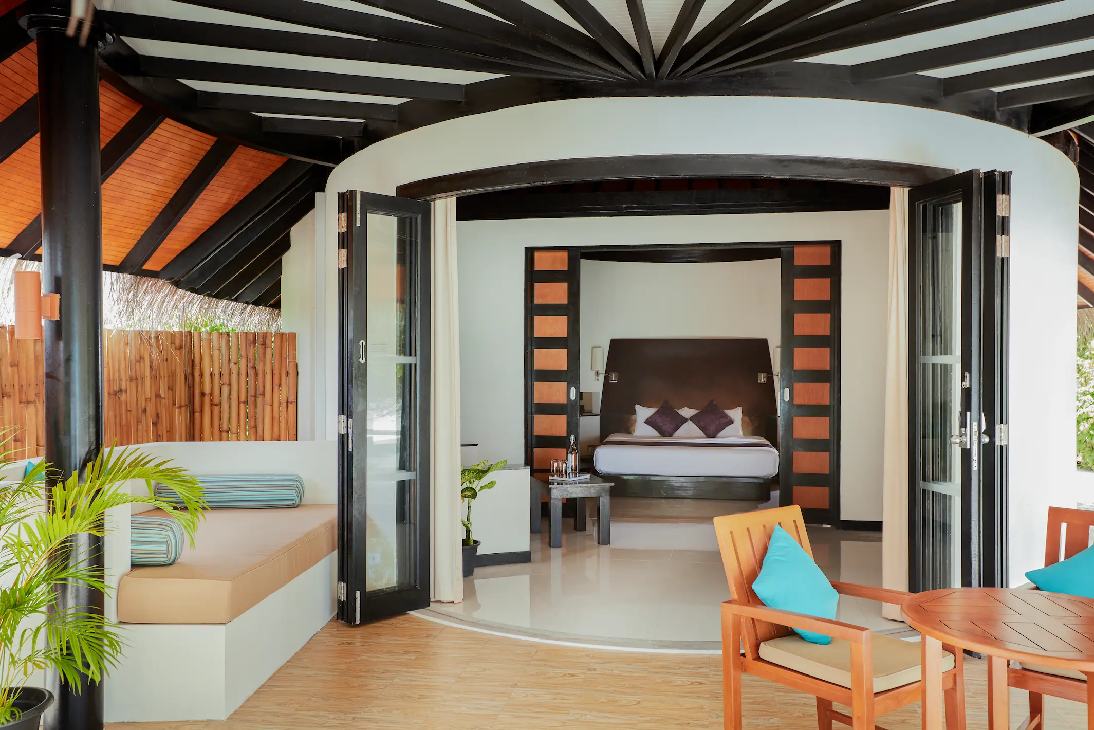 luxury deluxe family beach villa terrace at sun siyam iru fushi maldives private beachfront accommodation
