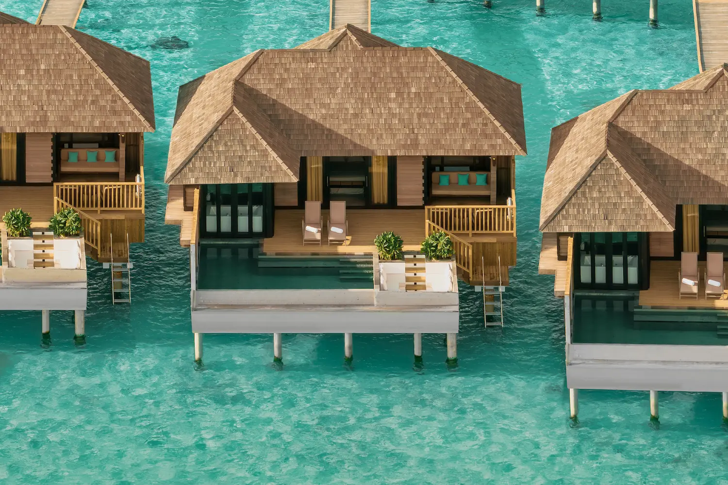 luxury horizon water villa with pool aerial view at sun siyam iru fushi maldives overwater accommodation