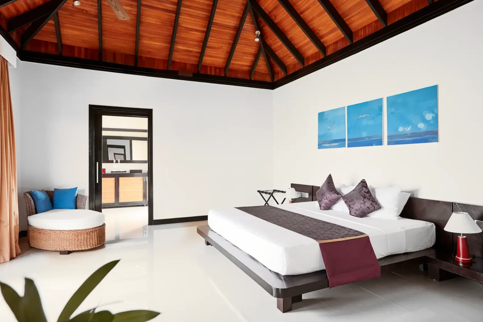 luxury infinity water villa bedroom at sun siyam iru fushi maldives overwater accommodation